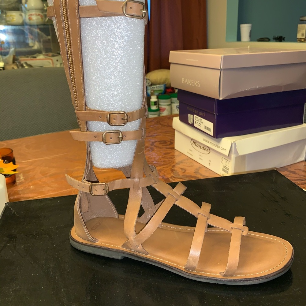 Leather knee hi gladiator style sandals.